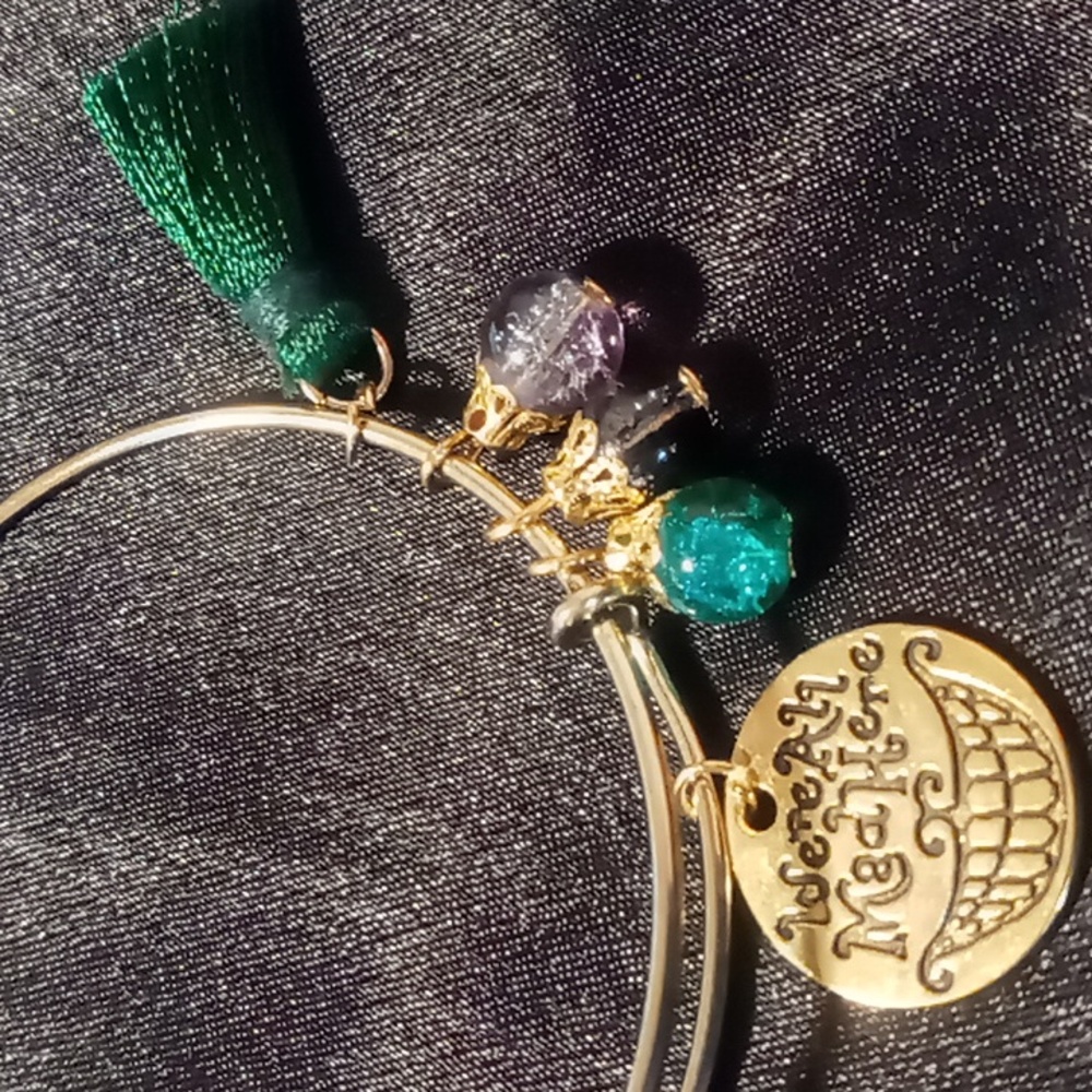 Cheshire Cat bangle bracelet Were All Mad here charm, green tassel & foil beads.